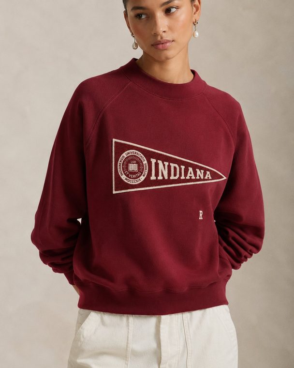 Women's crimson crewneck sweatshirt with an Indiana pennant patch.