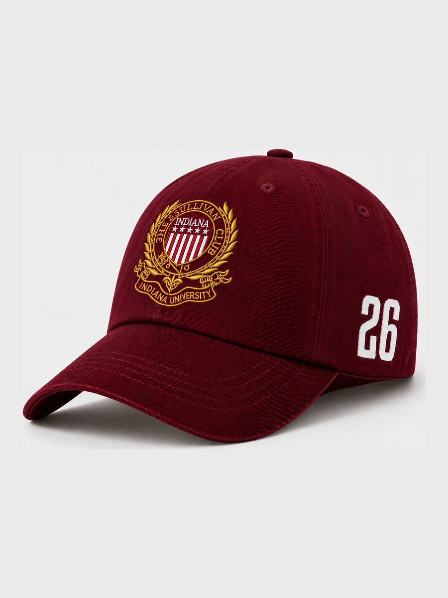 Sullivan Club crest cap in crimson, embroidered with the club crest and a cream 26 on the side.