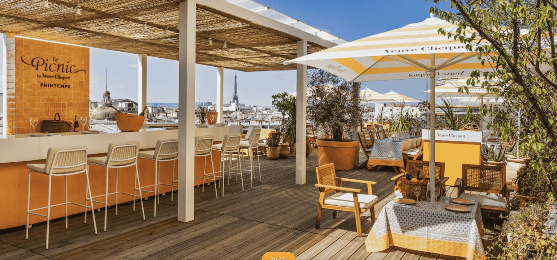 A Veuve Clicquot rooftop takeover with striped umbrellas
